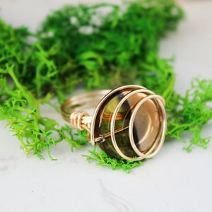 Handmade gold tone ring glass bead